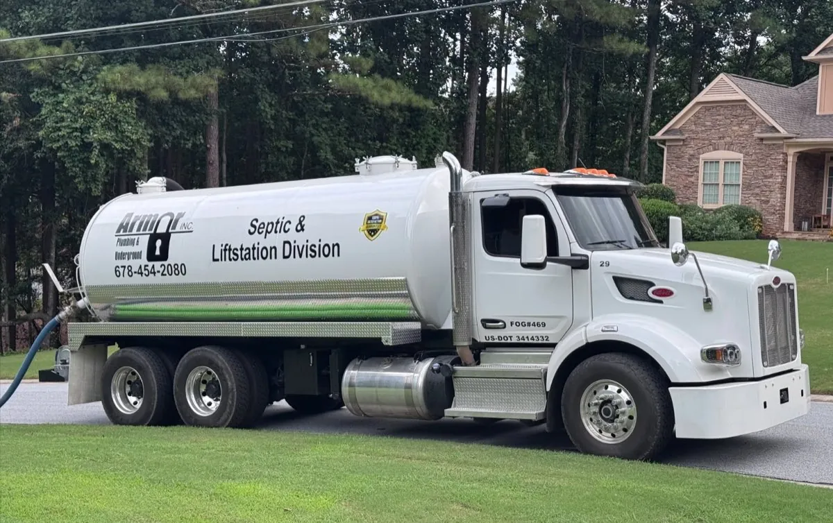 Armor Plumbing & Septic and Liftstation Division pump truck in a North Georgia neighborhood